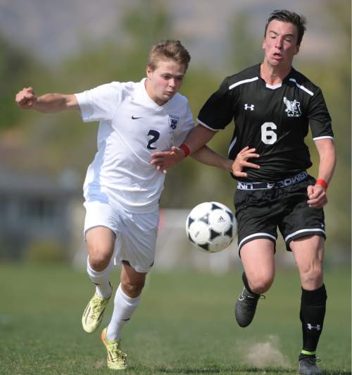 Steve Griffin  |  The Salt Lake Tribune

Brighton's Ben Fankhauser, right,  and Alta's Alec Groathouse chase down the ball during the Brighton versus Alta boy's soccer game at Brighton High School in Cottonwood Heights, Tuesday, April 21, 2015.