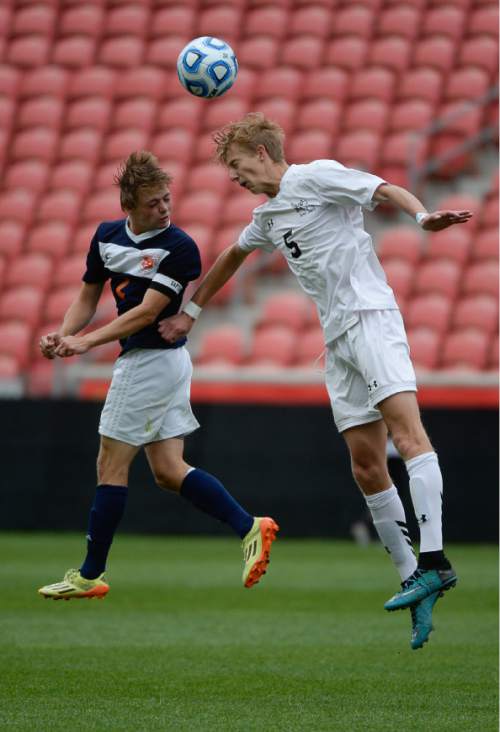 Francisco Kjolseth  |  The Salt Lake Tribune 
Brighton's Ben Fankhauser, left, goes up for a header against Alta's Aubie Anderson in game action during the 5A boys' soccer championship game at Rio Tinto Stadium on Thursday, May 21, 2015.