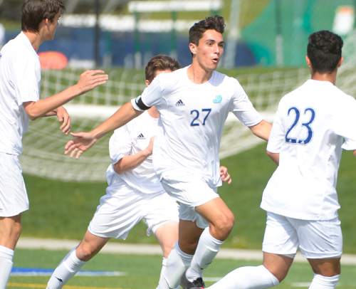 Leah Hogsten  |  The Salt Lake Tribune
Juan Diego's Julien Williamson celebrates his first half goal with the team. Juan Diego High School boys soccer hosted Hurricane High School during their state 3A first round game Thursday, April 30, 2015.
