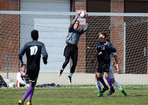 Scott Sommerdorf   |  The Salt Lake Tribune
Alta goalkeeper Alex Johnson makes a save during first half play. Alta beat Riverton 3-0 in a Class 5A boys soccer match at Alta, Friday, May 15, 2015.