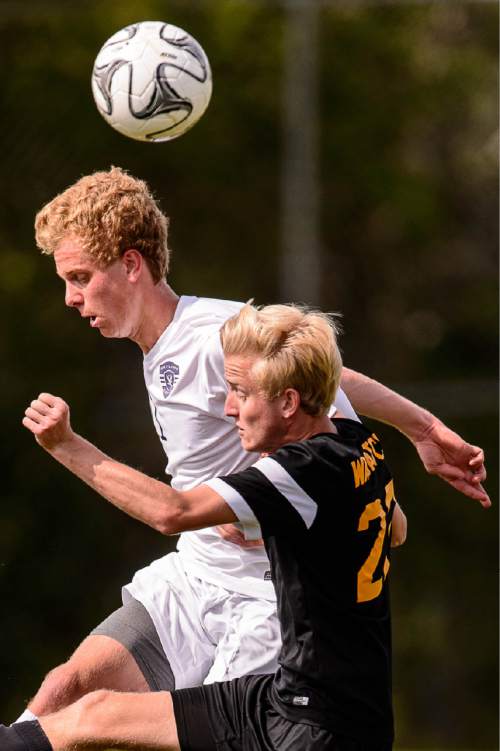 Trent Nelson  |  The Salt Lake Tribune
Skyline's Brigham Jackson (11) and Wasatch's Aidan Jensen (22) during a first round Class 4A soccer state game between Wasatch and Skyline High School, in Salt Lake City, Wednesday May 13, 2015.
