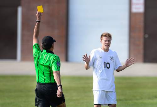 Scott Sommerdorf   |  The Salt Lake Tribune
Alta's Christian Bain begs forgiveness as he is yellow-carded for an infraction during second half play. Alta beat Riverton 3-0 in a Class 5A boys soccer match at Alta, Friday, May 15, 2015.