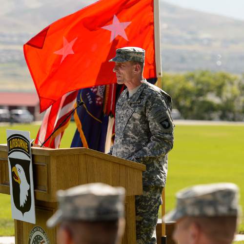 Trent Nelson  |  The Salt Lake Tribune
Commander Maj. Gen. Gary Volesky speaks as fifty-three Utah Guardmembers are realigned to the 101st Airborne Division (Air Assault) in an "Old Abe" patch ceremony at Camp Williams in Bluffdale, Friday June 19, 2015.