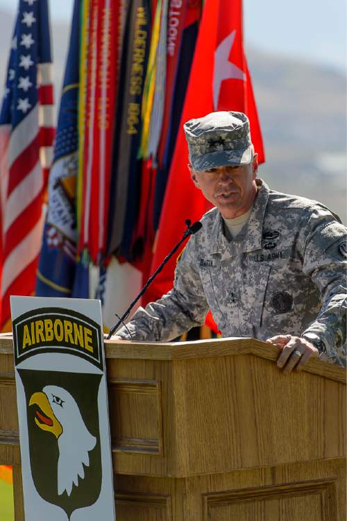 Trent Nelson  |  The Salt Lake Tribune
Major General Jefferson Burton speaks as fifty-three Utah Guardmembers are realigned to the 101st Airborne Division (Air Assault) in an "Old Abe" patch ceremony at Camp Williams in Bluffdale, Friday June 19, 2015.