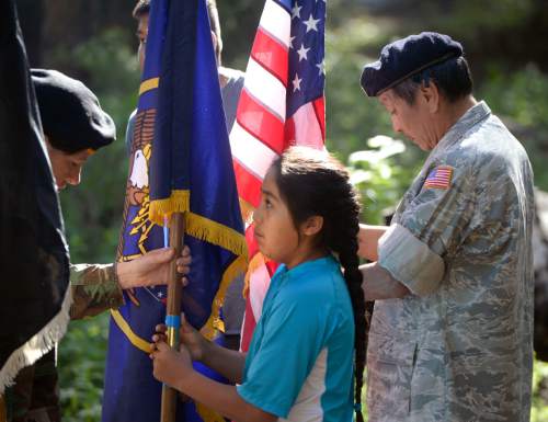 Al Hartmann |  The Salt Lake Tribune
Native American children participate in a flag ceremony with their elders who served in the armed forces to start  the Native American Church of North America's Youth Conference, part of its national conference at Redman Campground in Little Cottonwood Canyon Thursday June 18, 2015. The conference is expected to have 400 Native American children and their families attend the conference, which includes members from around the country and Canada.