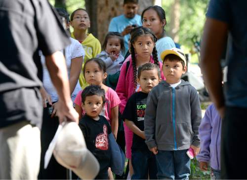 Al Hartmann |  The Salt Lake Tribune
Native American children listen to an elder's story at the Native American Church of North America's Youth Conference, part of its national conference at Redman Campground in Little Cottonwood Canyon Thursday June 18. The conference is expected to have 400 Native American children and their families attend the conference, which includes members from around the country and Canada.