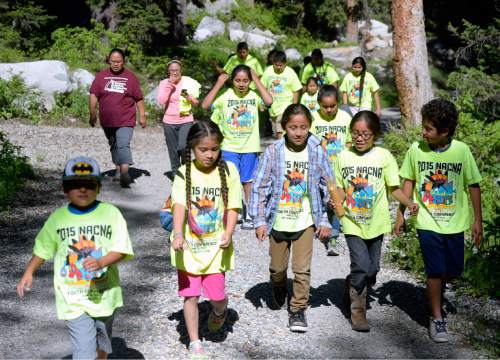 Al Hartmann |  The Salt Lake Tribune
Native American children go on a nature walk at the Native American Church of North America's Youth Conference, part of its national conference at Redman Campground in Little Cottonwood Canyon Thursday June 18. The conference is expected to have 400 Native American children and their families attend the conference, which includes members from around the country and Canada.