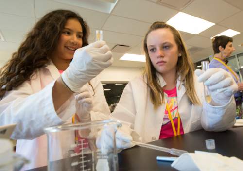 Rick Egan  |  The Salt Lake Tribune

Sky Jalili and Jade Montgomery work on a chemistry experiment at the four-day AWE+SUM Summer Girls Camp where eighth-grade girls participate in science and math and hands-on workshops at Westminster, Friday, June 19, 2015.