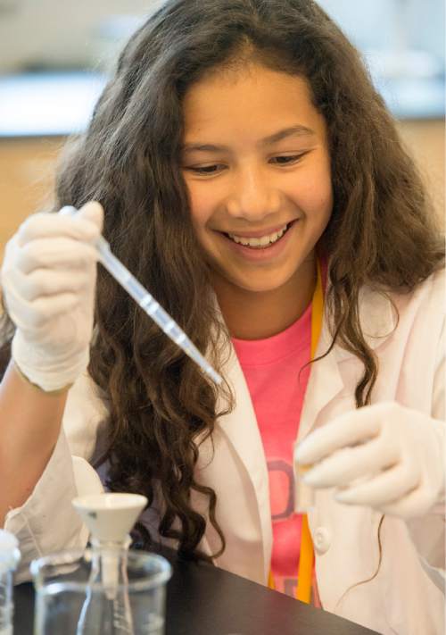 Rick Egan  |  The Salt Lake Tribune

Eighth-grade student Sky Jalili works on a chemistry experiment at the AWE+SUM Summer Girls Camp where eighth-grade girls participate in science and math and hands-on workshops during the four-day camp at Westminster, Friday, June 19, 2015.