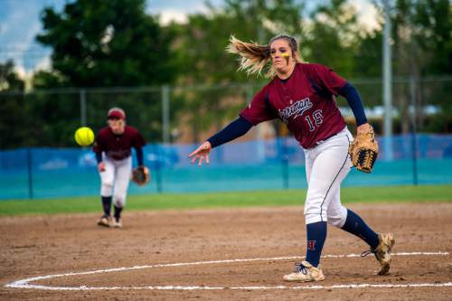 Chris Detrick  |  The Salt Lake Tribune
Herriman's Bryce Taylor (18) pitches during the game at Valley Softball Complex Tuesday May 19, 2015.