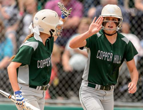 Trent Nelson  |  The Salt Lake Tribune
Copper Hills's Kiera Siddoway (8) and Paige Watts (9) celebrate afters scoring on a double by Tabitha Atwood (18). Herriman vs. Copper Hills High School softball, in West Valley City, Thursday May 21, 2015.