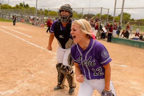 Trent Nelson  |  The Salt Lake Tribune
Lehi's Sydney White celebrates after beating Herriman in the 5A high school softball championship game, in West Valley City, Friday May 22, 2015.