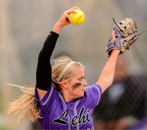 Trent Nelson  |  The Salt Lake Tribune
Lehi pitcher Sydney White delivers during a 5A softball tournament second-round game between defending champion Lehi and No. 1 seed Taylorsville, Thursday May 14, 2015.