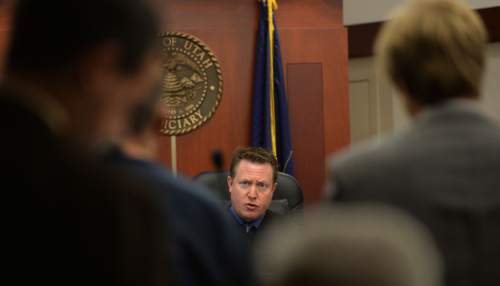 Steve Griffin  |  The Salt Lake Tribune


Judge James Blanch, center, talks to Bill Robert Thompson during his iInitial appearance for first-degree felony murder and other counts in connection with an alleged May 8 drunken driving episode in which he killed 43-year-old Susan Madsen and critically injured her daughter, Tessa. Thompson appeared at the Matheson Courthouse in Salt Lake City, Utah Thursday, May 22, 2014.