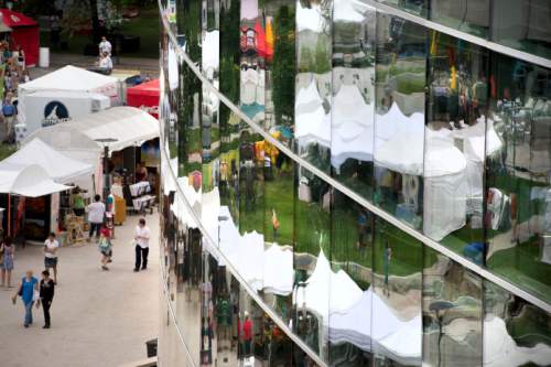 Steve Griffin  |  The Salt Lake Tribune


Tents are reflected in the Main Library windows during pening day of the Arts Festival in Salt Lake City, Utah Thursday, June 26, 2014.