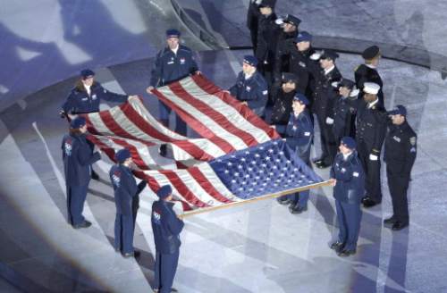 Trent Nelson  |  Tribune file photo

The flag that was recovered from the rubble of the World Trade Center is carried into the Opening Ceremony of 2002 Olympic Winter Games on February 8, 2002.