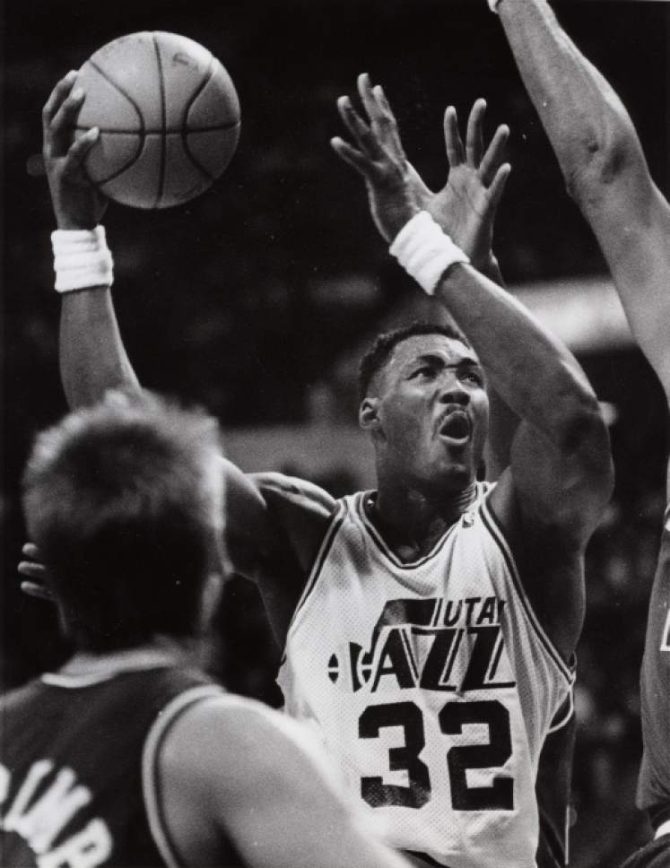 Steve Griffin  |  The Salt Lake Tribune

Karl Malone drives the lane and looks to the basket as he gets fouled on the play December 25, 1988.