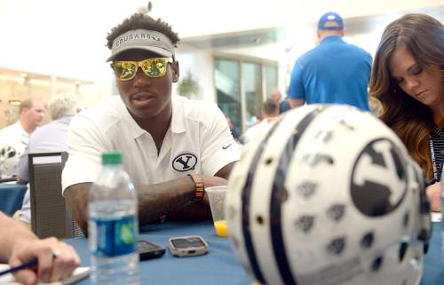 Al Hartmann |  The Salt Lake Tribune
BYU senior runningback Jamaal Williams answers reporter's question during informal interviews Tuesday June 24 for BYU football media day in Provo.