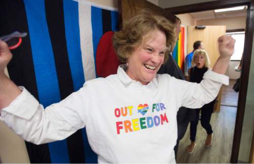 Steve Griffin  |  The Salt Lake Tribune


ACLU executive director Karen McCreary pumps her fists with excitement as the Utah Pride Center responds to the US Supreme Court marriage equality ruling granting full marriage equality across the United States during a press conference at the Utah Pride Center in Salt Lake City, Friday, June 26, 2015.