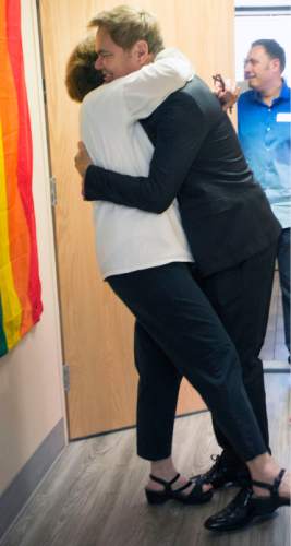 Steve Griffin  |  The Salt Lake Tribune


ACLU executive director Karen McCreary gets a big hug from Human Rights Campaign board member Bruce Bastian as the Utah Pride Center responds to the US Supreme Court marriage equality ruling granting full marriage equality across the United States during a press conference at the Utah Pride Center in Salt Lake City, Friday, June 26, 2015.