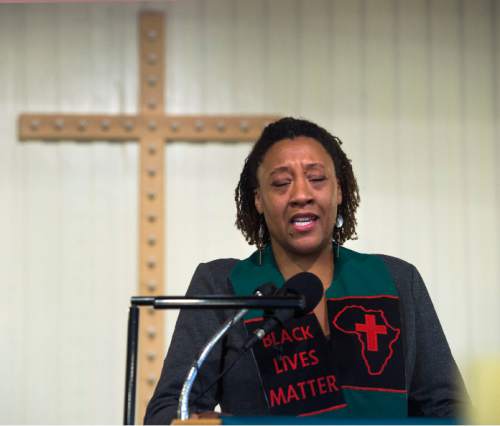 Steve Griffin  |  The Salt Lake Tribune


Rev. Brandee Jasmine Mimitzaraiem of the Embry Chapel African Methodist Episcopal Church prays for the victims in the shootings in Charleston, South Carolina during prayer vigil at the Ogden, Utah church Friday, June 19, 2015. Each victim was remembered by nine interfaith religious leaders during the service.