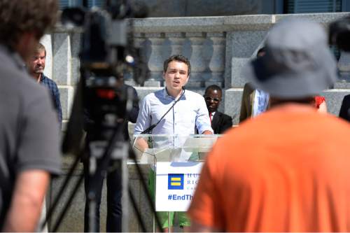 Scott Sommerdorf   |  The Salt Lake Tribune
Russian LGBT activist Dmitry Chizhevsky speaks at a news conference held on the south side of the Utah Capitol on Saturday. The Human Rights Campaign -- the nation's largest LGBT civil rights organization --announced its partnership with the Inclusive Families Coalition, promoting a positive vision of LGBT people.