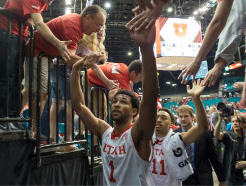 Rick Egan  |  The Salt Lake Tribune

Utah Utes guard Isaiah Wright (1) and Utah Utes guard Brandon Taylor (11) head to the locker room, after defeating Stanford, 80-56, in Pac-12 Basketball Championship action Utah vs. Stanford, at the MGM Arena, in Las Vegas, Thursday, March 12, 2015.