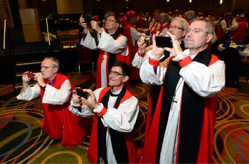 Scott Sommerdorf   |  The Salt Lake Tribune
Episcopal bishops scramble to take their own photos of a rare grouping of all 18 female Episcopal bishops at the General Convention of the Episcopal Church held at the Salt Palace in Salt Lake City, Sunday, June 28, 2015.