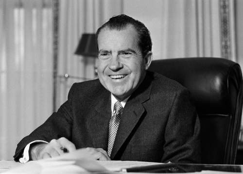FILE - This Jan. 21, 1969 file photo shows President Richard Nixon at his desk at the White House in Washington. Nixon suffered a stroke in 1994 and died days later at age 81. Thursday, Aug. 7, 2014 marks the 40th anniversary of his resignation. (AP Photo/File)