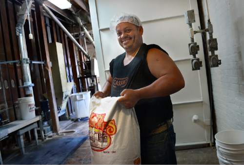 Scott Sommerdorf   |  The Salt Lake Tribune
Mill worker Severo Ceceña is the modern-day Kevin Bacon as he hefts a 50-pound bag of flour in the same spot the actor did in the 1984 movie "Footloose," which used Lehi Roller Mills as a backdrop. 
Maker of premium flour for three generations, the mill faced dire financial woes three years ago, but is now thriving under new ownership, Wednesday, June 24, 2015.