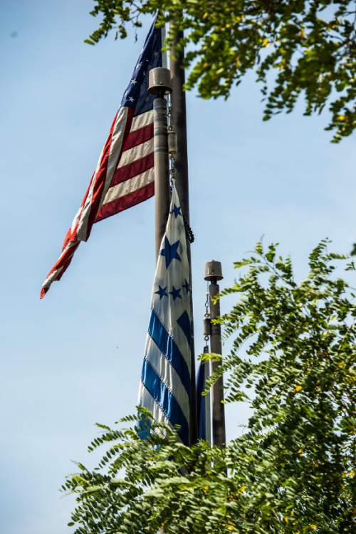 Chris Detrick  |  The Salt Lake Tribune
The Flag of Utah, American Flag and Deseret Flag at Ensign Peak Nature Park Wednesday July 1, 2015.