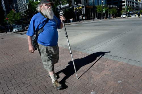 Scott Sommerdorf   |  The Salt Lake Tribune
Jamie Cowen during one of his photo walks on Main Street, Thursday, May 28, 2015. Cowen loves street photography in the beautiful afternoon light.