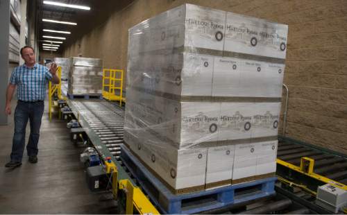 Rick Egan  |  The Salt Lake Tribune

Cade Meier, Warehouse General Manager, explains the Automated Storage Retrieval System at the DABC liquor warehouse, Thursday, April 30, 2015.