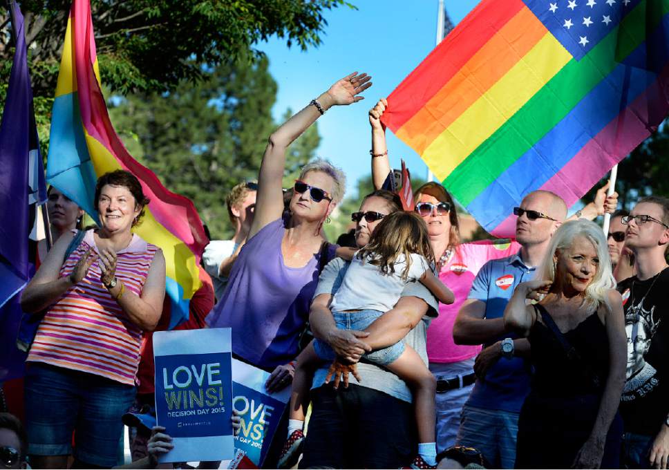 Scott Sommerdorf   |  The Salt Lake Tribune
Some of the hundreds of participants cheer at a rally in City Creek Park to celebrate the SCOTUS ruling, Friday, June 26, 2015.