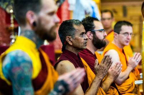 Chris Detrick  |  The Salt Lake Tribune
Members of Sangha participate in the 9th annual Prayers for Compassion at Urgyen Samten Ling Gonpa Thursday July 2, 2015.  Utah Buddhists at this traditional Tibetan temple in Salt Lake City will chant more than a million mantras in annual around-the-clock Prayers for Compassion for 2015, this year dedicated to helping rebuild earthquake-damaged Nepal.