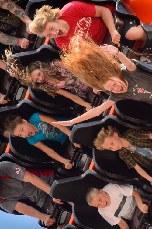 Trent Nelson  |  The Salt Lake Tribune
Riders on Lagoon's new thrill ride Cannibal, Wednesday July 8, 2015. The roller coaster plunges riders into a 116 degree free-fall and up to 70 mph.