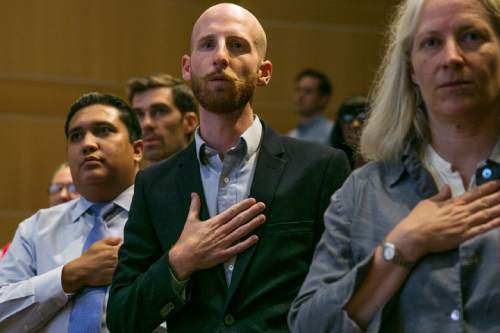 Mark Johnston  |  Special to the Tribune 

From right, candidates Jennifer Colby, Derek Kitchen, Miles Petty, Nate Salazar and Babs De Lay say the Pledge of Allegiance before a debate for the District 4 Salt Lake City Council seat held at the Nancy Tessman Auditorium at Salt Lake City's Main Library Thursday, July 9, 2015.