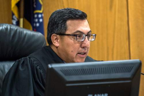 Chris Detrick  |  The Salt Lake Tribune
Judge Darold McDade speaks during the sentencing of Meagan Grunwald at 4th District Court in Provo Wednesday July 8, 2015.  Eighteen-year-old Meagan Grunwald was sentenced Wednesday to 25 years to life in prison for being an accomplice to the murder last year of Utah County Sheriff's Sgt. Cory Wride and the attempted murder of Deputy Greg Sherwood.