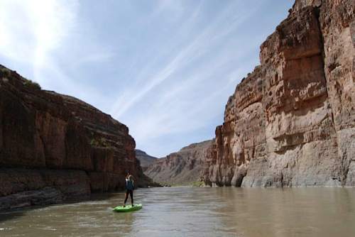 Brian Maffly  |  The Salt Lake Tribune

Olivia Bailey of Salt Lake City paddles down the San Juan River downstream from Bluff. The cliffs on the right side of the river are part of three different conservation proposals centered on Cedar Mesa. The left side of the river is the Navajo Reservation.