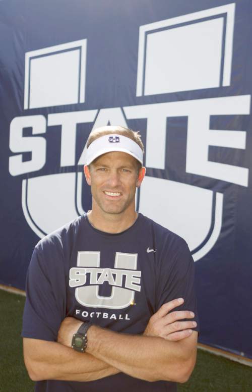 Trent Nelson  |  The Salt Lake Tribune
Utah State University's new offensive coordinator Matt Wells in Romney Stadium in Logan, Utah Wednesday, August 22, 2012.