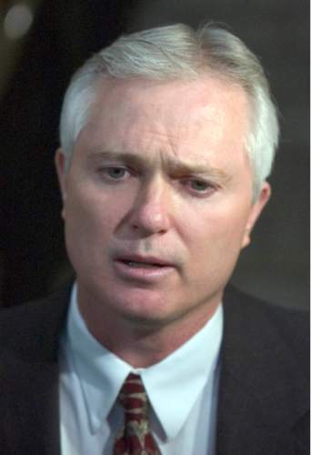 Rick Egan  |  The Salt Lake Tribune 

Polygamist John Daniel Kingston talks to the press after the hearing with Judge Valdez Friday October 22, 2004.