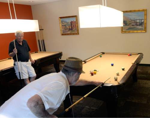 Al Hartmann  |  The Salt Lake Tribune 
Seniors break in the new pool tables at the new Salt Lake County Midvale Senior Center at 7550 South Main St. which opened Wednesday July 15 with a ribbon cutting ceremony.