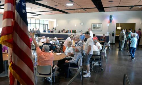 Al Hartmann  |  The Salt Lake Tribune 
Seniors gather in the large dining room that features a large entertainment stage at the new Salt Lake County Midvale Senior Center at 7550 South Main St. which opened Wednesday July 15 with a ribbon cutting ceremony.