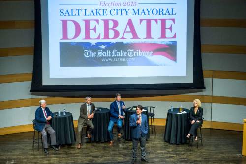 Chris Detrick  |  The Salt Lake Tribune
City Council Chairman Luke Garrott speaks during a Salt Lake City Mayoral Debate at Salt Lake City's Main Library Thursday July 16, 2015.  The other participants are Salt Lake City Mayor Ralph Becker, former state legislator Jackie Biskupski, community activist George Chapman, and businessman Dave Robinson.