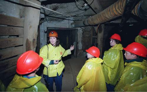 Craig Hansell  |  Tribune File Photo

Tour guide Chris Dekoning, the third generation of her family to work in the mine, explains the ventilation system deep inside Park City's Ontario Mine. Oct. 8, 1996.