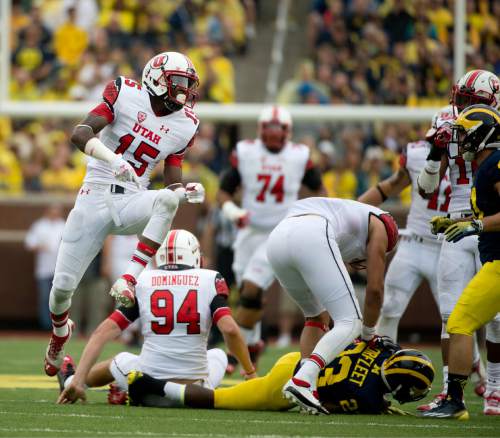 Jeremy Harmon  |  The Salt Lake Tribune

Utah Utes wide receiver Dominique Hatfield (15) celebrates a play as the Utes face the Wolverines in Ann Arbor, Saturday, Sept. 20, 2014.