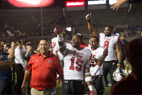 Rick Egan  |  The Salt Lake Tribune

Utah Utes wide receiver Dominique Hatfield (15) and The Utes celebrate their 30-28 upset over UCLA as they head to the locker room, in Pac 12 action, at the Rose Bowl, Saturday, October 4, 2014
