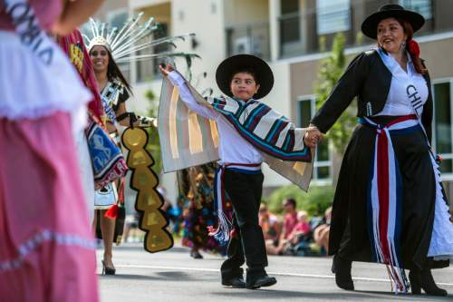 Chris Detrick  |  The Salt Lake Tribune
Members of the Ballet Las Americas sponsored by Centro Civico Mexicano participate in the annual Days of '47 Youth Parade through downtown Salt Lake City Saturday, July 18, 2015.