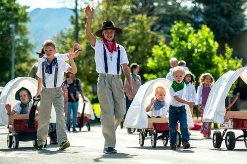 Chris Detrick  |  The Salt Lake Tribune
Members of the Centerville Utah Stake participate in the annual Days of '47 Youth Parade through downtown Salt Lake City Saturday, July 18, 2015.