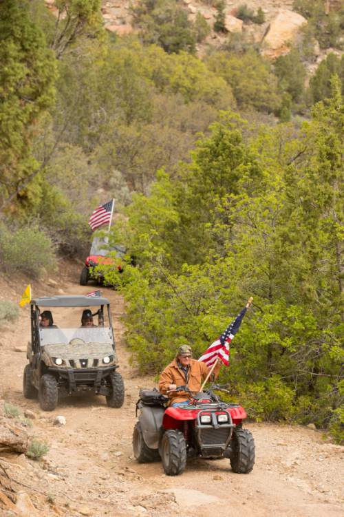 Trent Nelson  |  The Salt Lake Tribune
Motorized vehicles make their way through Recapture Canyon, which has been closed to motorized use since 2007, after a call to action by San Juan County Commissioner Phil Lyman. Saturday May 10, 2014 north of Blanding.